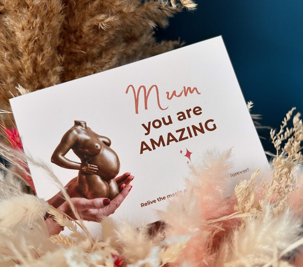 Bellyprint gift voucher styled with pampas grass, a thoughtful and elegant gift to celebrate pregnancy and create lasting memories.